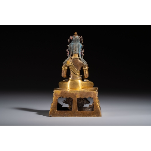 267 - A Sino-Tibetan gilt-bronze figure of Buddha Amitayus, inscribed, QianlongH.: 18,3 cm 
Weight: 1410 g... 