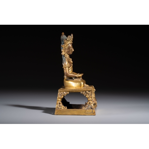 267 - A Sino-Tibetan gilt-bronze figure of Buddha Amitayus, inscribed, QianlongH.: 18,3 cm 
Weight: 1410 g... 