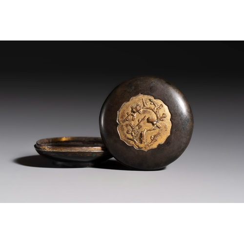 269 - A fine Chinese parcel-gilt bronze 'Bird Among Blossoming Plum Branches' box and cover, 18th C.Dia.: ... 