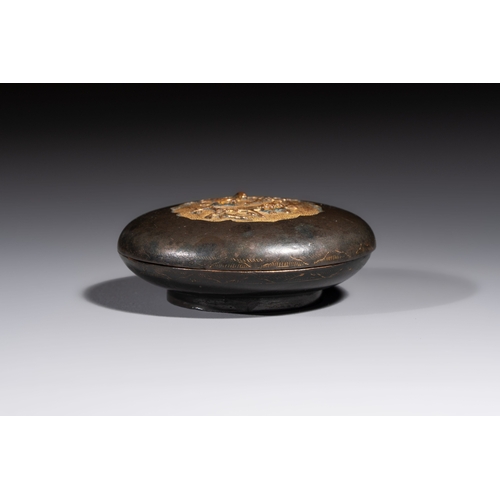 269 - A fine Chinese parcel-gilt bronze 'Bird Among Blossoming Plum Branches' box and cover, 18th C.Dia.: ... 