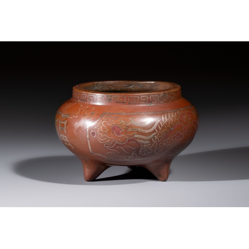 279 - A Chinese or Vietnamese silver-inlaid bronze 'Fu Lu Shou' tripod censer,  Xuande mark, 19th C.Dia.: ... 