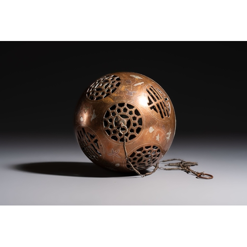 280 - A Chinese or Vietnamese silver-inlaid copper reticulated spherical censer and a silver- and copper-i... 