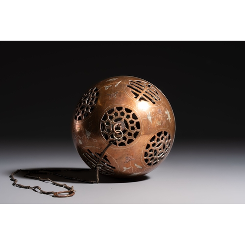 280 - A Chinese or Vietnamese silver-inlaid copper reticulated spherical censer and a silver- and copper-i... 