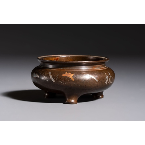 280 - A Chinese or Vietnamese silver-inlaid copper reticulated spherical censer and a silver- and copper-i... 