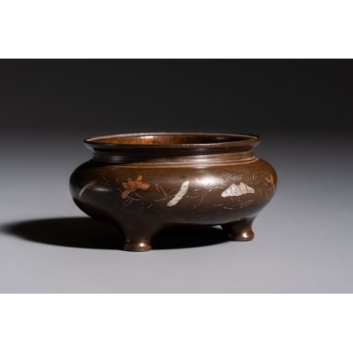 280 - A Chinese or Vietnamese silver-inlaid copper reticulated spherical censer and a silver- and copper-i... 