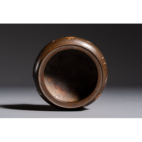 280 - A Chinese or Vietnamese silver-inlaid copper reticulated spherical censer and a silver- and copper-i... 