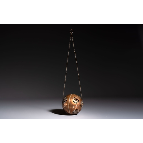 280 - A Chinese or Vietnamese silver-inlaid copper reticulated spherical censer and a silver- and copper-i... 