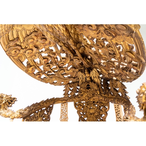 282 - An exceptional Vietnamese gilt-lacquered wood and ivory 'Dragon and Phoenix' throne-shaped altar, 18... 