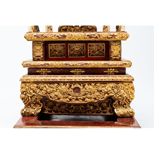 282 - An exceptional Vietnamese gilt-lacquered wood and ivory 'Dragon and Phoenix' throne-shaped altar, 18... 