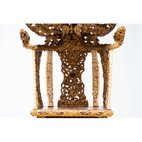 282 - An exceptional Vietnamese gilt-lacquered wood and ivory 'Dragon and Phoenix' throne-shaped altar, 18... 