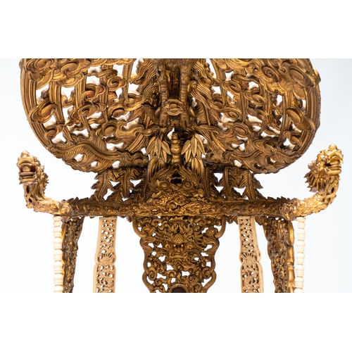 282 - An exceptional Vietnamese gilt-lacquered wood and ivory 'Dragon and Phoenix' throne-shaped altar, 18... 