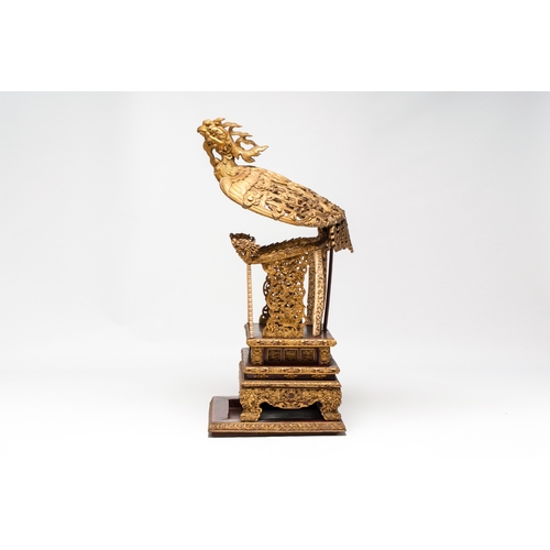 282 - An exceptional Vietnamese gilt-lacquered wood and ivory 'Dragon and Phoenix' throne-shaped altar, 18... 