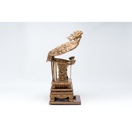 282 - An exceptional Vietnamese gilt-lacquered wood and ivory 'Dragon and Phoenix' throne-shaped altar, 18... 