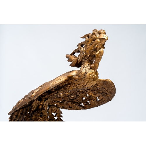 282 - An exceptional Vietnamese gilt-lacquered wood and ivory 'Dragon and Phoenix' throne-shaped altar, 18... 