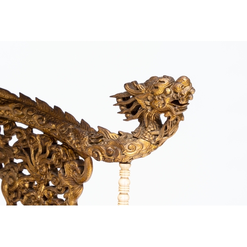 282 - An exceptional Vietnamese gilt-lacquered wood and ivory 'Dragon and Phoenix' throne-shaped altar, 18... 