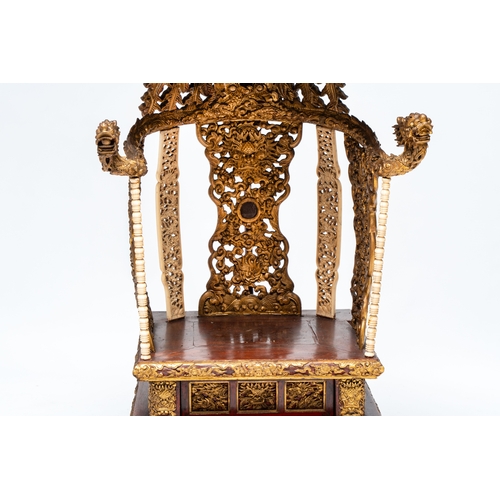 282 - An exceptional Vietnamese gilt-lacquered wood and ivory 'Dragon and Phoenix' throne-shaped altar, 18... 