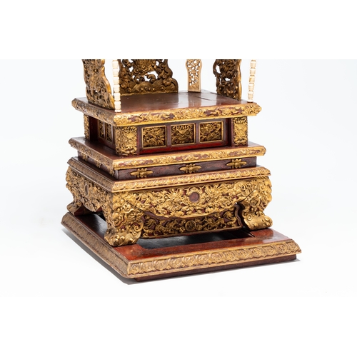 282 - An exceptional Vietnamese gilt-lacquered wood and ivory 'Dragon and Phoenix' throne-shaped altar, 18... 