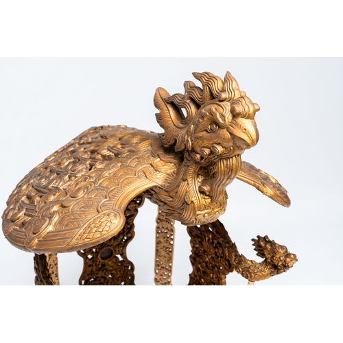 282 - An exceptional Vietnamese gilt-lacquered wood and ivory 'Dragon and Phoenix' throne-shaped altar, 18... 