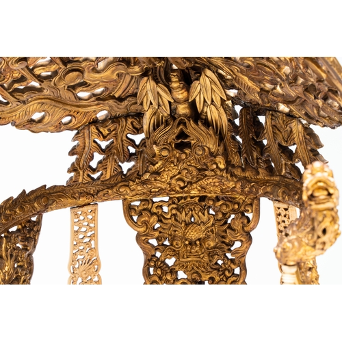 282 - An exceptional Vietnamese gilt-lacquered wood and ivory 'Dragon and Phoenix' throne-shaped altar, 18... 