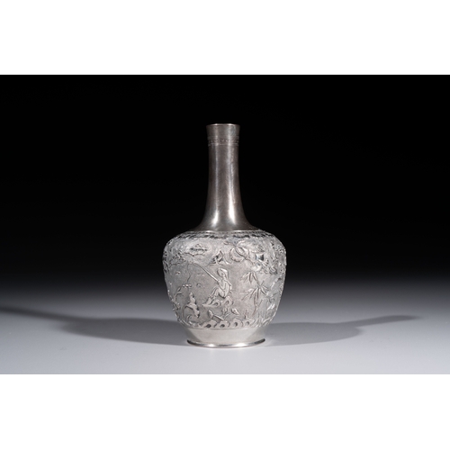 294 - A Chinese Canton or Vietnamese silver bottle vase with landscape design and six cups, 19th C.H.: 12 ... 