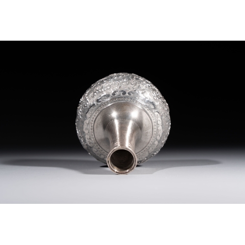 294 - A Chinese Canton or Vietnamese silver bottle vase with landscape design and six cups, 19th C.H.: 12 ... 