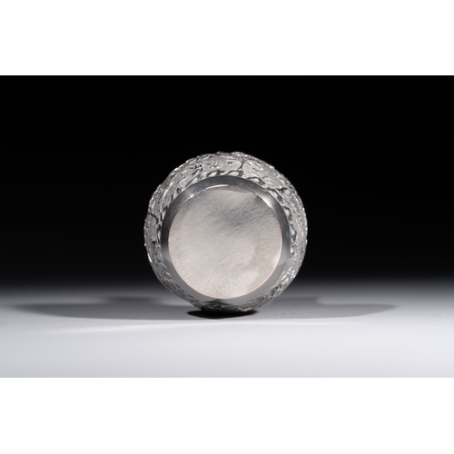 294 - A Chinese Canton or Vietnamese silver bottle vase with landscape design and six cups, 19th C.H.: 12 ... 