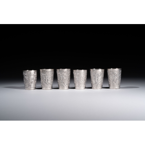 294 - A Chinese Canton or Vietnamese silver bottle vase with landscape design and six cups, 19th C.H.: 12 ... 