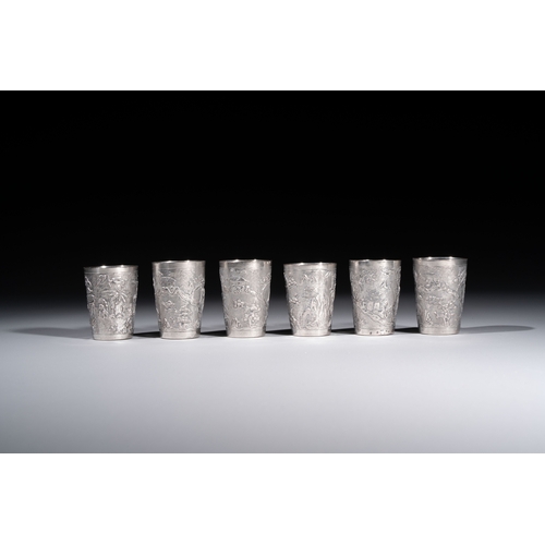294 - A Chinese Canton or Vietnamese silver bottle vase with landscape design and six cups, 19th C.H.: 12 ... 