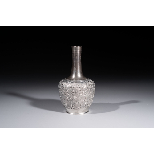 294 - A Chinese Canton or Vietnamese silver bottle vase with landscape design and six cups, 19th C.H.: 12 ... 