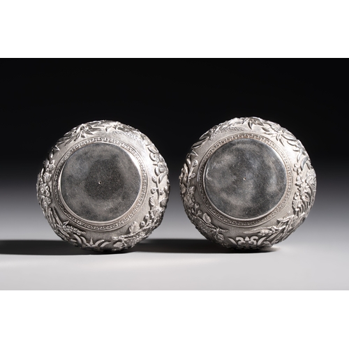 296 - A pair of Chinese silver jarlets, a pair of saucer dishes, a rectangular casket and a cylindrical bo... 