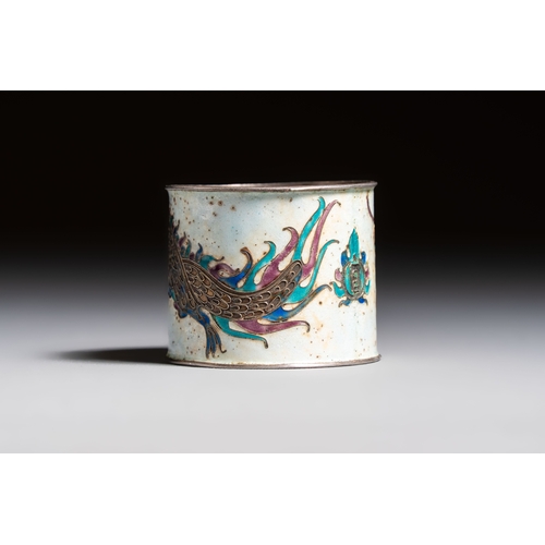 298 - A Chinese enamelled silver 'Dragon' napkin ring, a pair of silver buckles and a pair of cloisonné bu... 