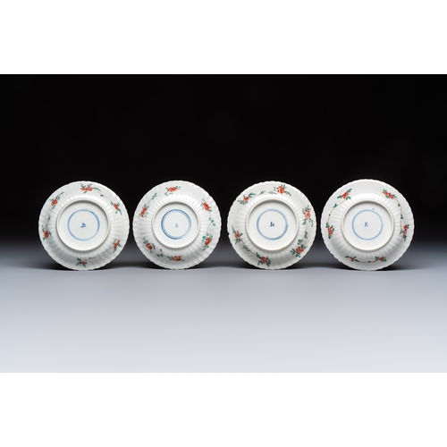 26 - Four Chinese famille verte cups and seven saucers, 19th C.Dia.: 12,5 cm (the saucers)Dia.: 7,9 cm - ... 