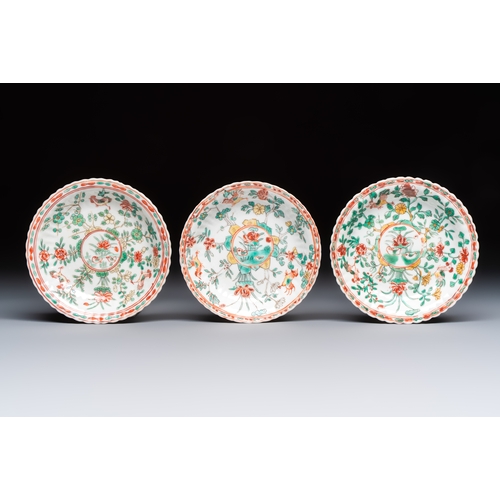 26 - Four Chinese famille verte cups and seven saucers, 19th C.Dia.: 12,5 cm (the saucers)Dia.: 7,9 cm - ... 