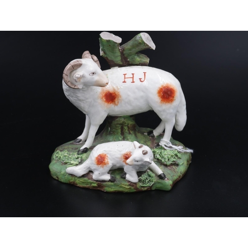 1 - A pair of 19th Century Royal Staffordshire figurines, 1 x Ram and 1 x Scottish Flatback, both figure... 