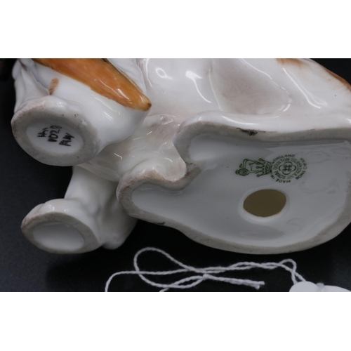 2 - Porcelain Royal Doulton Figurine with a Pheasant in its mouth.