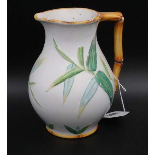 201 - Victorian Majolica Minton Jug with bamboo handle and leaf decoration, impressed mark Minton on the b... 