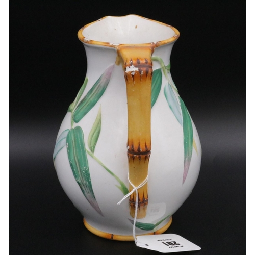 201 - Victorian Majolica Minton Jug with bamboo handle and leaf decoration, impressed mark Minton on the b... 