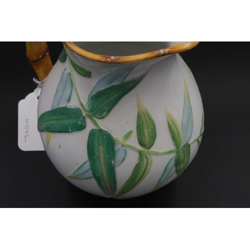 201 - Victorian Majolica Minton Jug with bamboo handle and leaf decoration, impressed mark Minton on the b... 