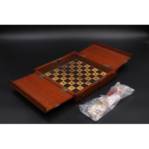 218 - An 8 inch travel Chess Set by Whittington, Bone-Wood travel chess set circa 1900 - 1915. Unfortunate... 