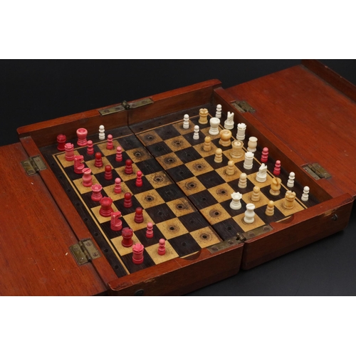 218 - An 8 inch travel Chess Set by Whittington, Bone-Wood travel chess set circa 1900 - 1915. Unfortunate... 