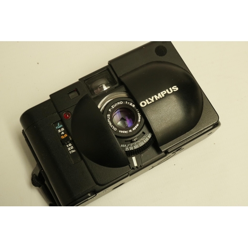 224 - Olympus XA with A16 Flash Camera. The XA is one of the smallest range finder cameras ever made. All ... 