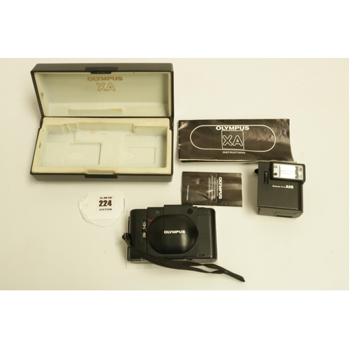 224 - Olympus XA with A16 Flash Camera. The XA is one of the smallest range finder cameras ever made. All ... 