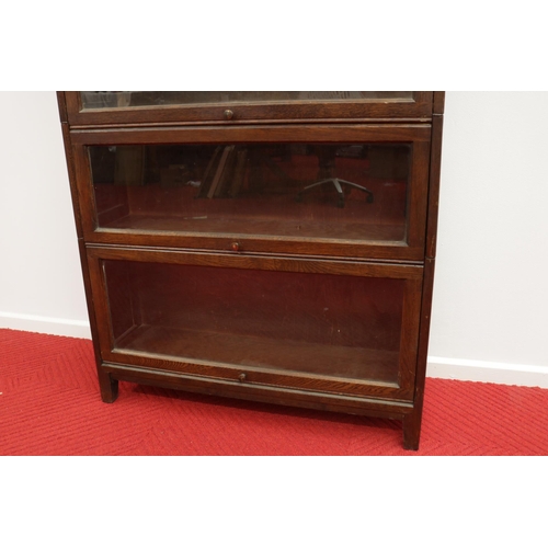 285 - Lovely vintage stacking oak & glass bookcase by Angus, with their motif inside.