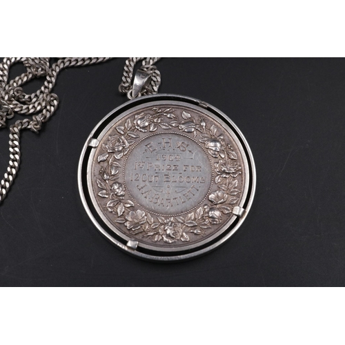 306 - Awarded to J.A. Bartlett in 1904, an antique sterling silver medal from the 