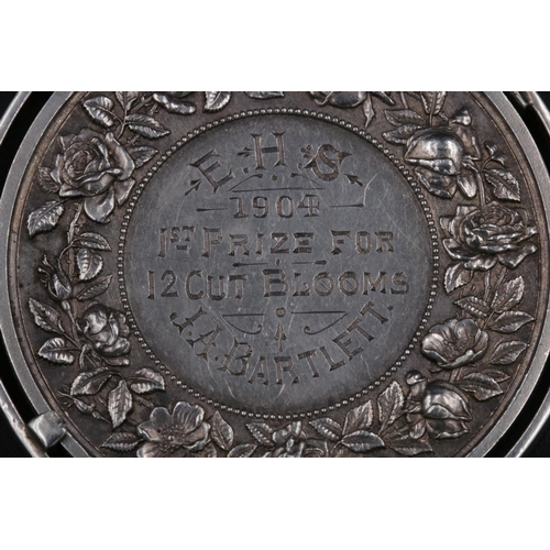 306 - Awarded to J.A. Bartlett in 1904, an antique sterling silver medal from the 