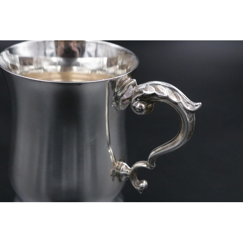 316 - A Silver tankard weighing 180 grams.