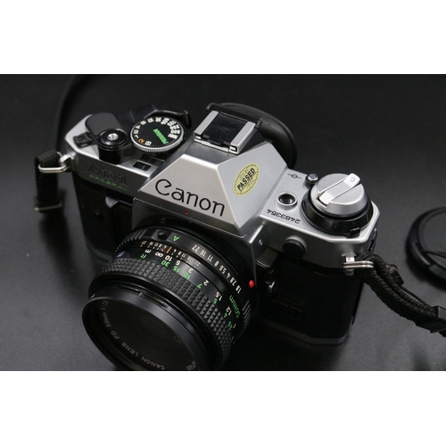 335 - Cannon AE1 Programme Camera 50mm with Lens, Case, Manual & Accessories.