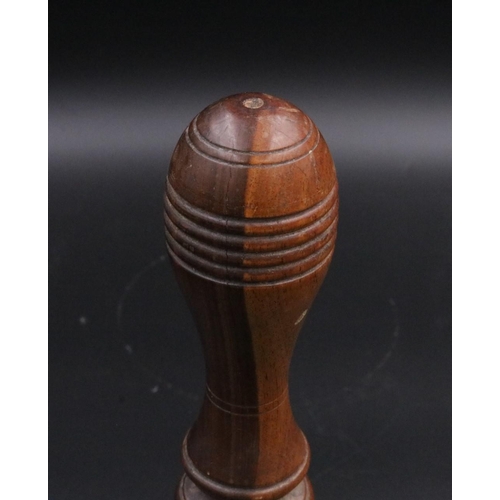 343 - A vintage handheld bell with with wooden handle. (11 inches)