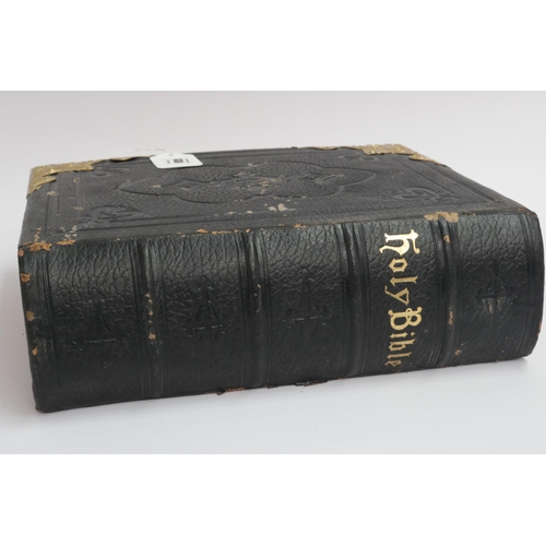 36 - An 1890 Leather and Brass Bible with an abridgement of the commentaries of Scott & Henry. All conden... 