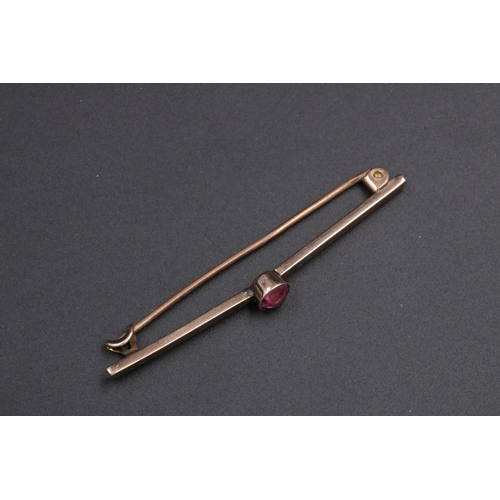 89 - 9CT Gold Tie Pin With Coloured Stone 1.9 Grams